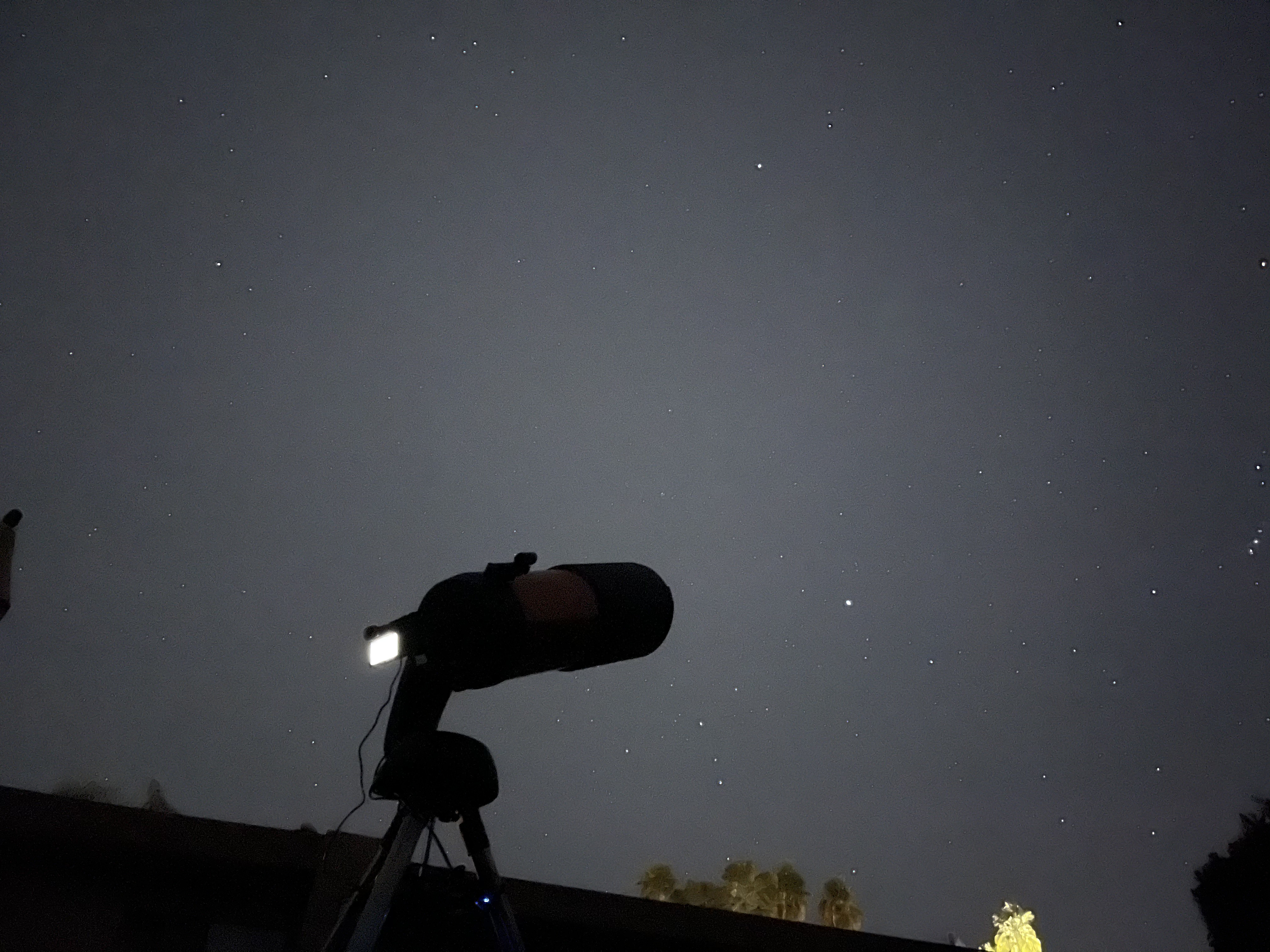 Telescope under the night sky